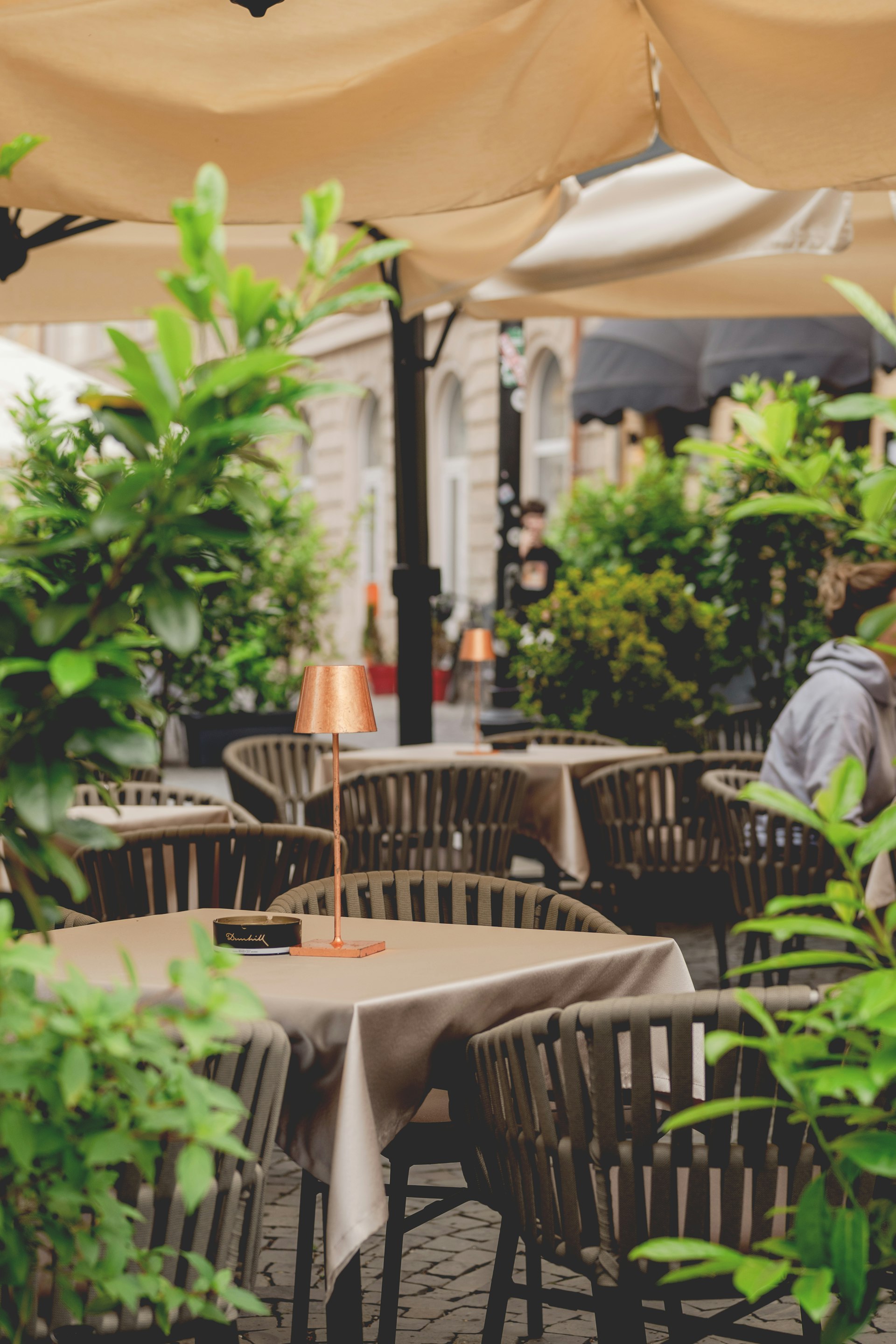 Sunlit garden porch seating at Stellos Coffee